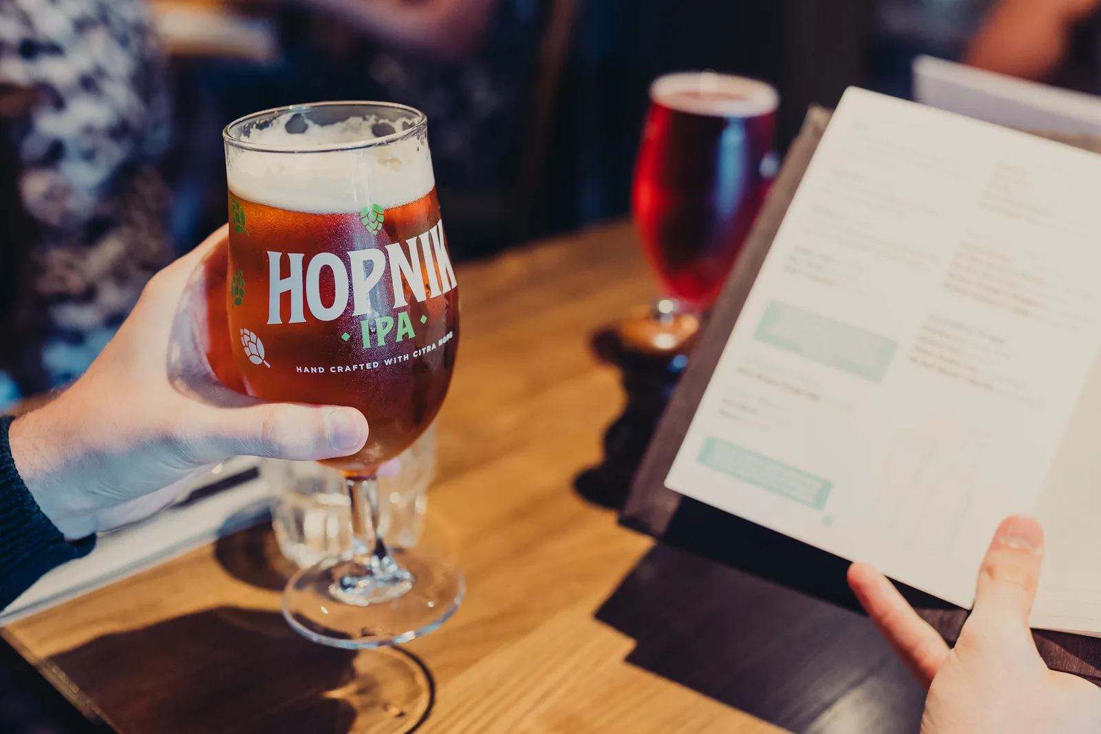 Someone holding an IPA