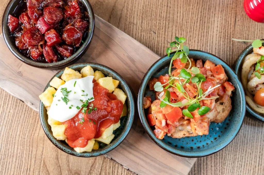 Three small dishes on a table
