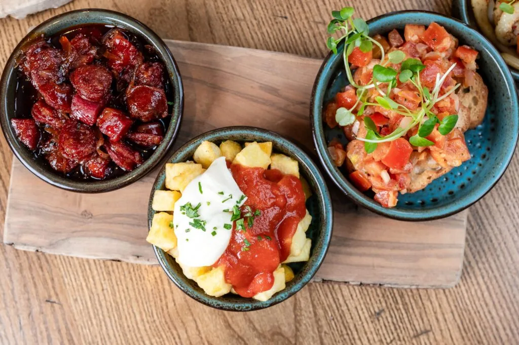 Three small dishes on a table