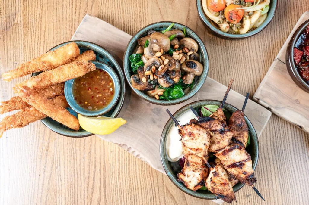 Three small dishes on a table