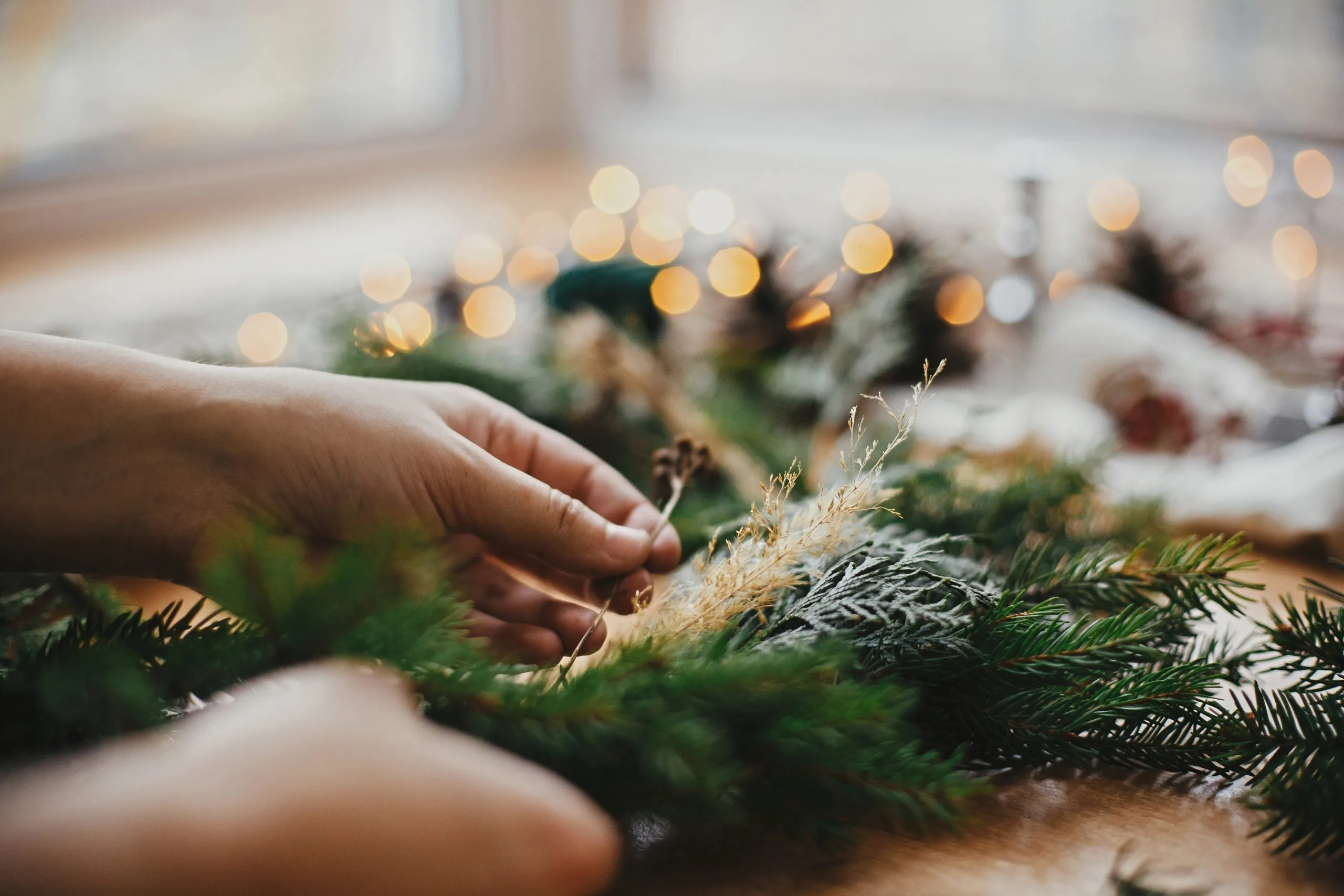 A hand on a Christmas Tree